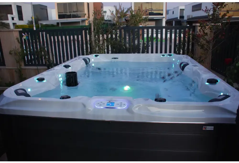 PassionSpa Desire hot tub – Signature Collection, white finish, black accents, blue LED lighting
