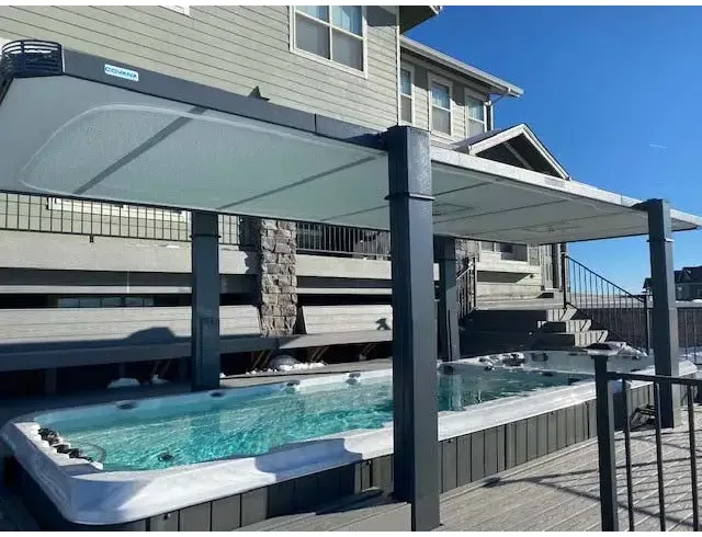PassionSpa Vitality swim spa – modern grey pergola with translucent roof panels
