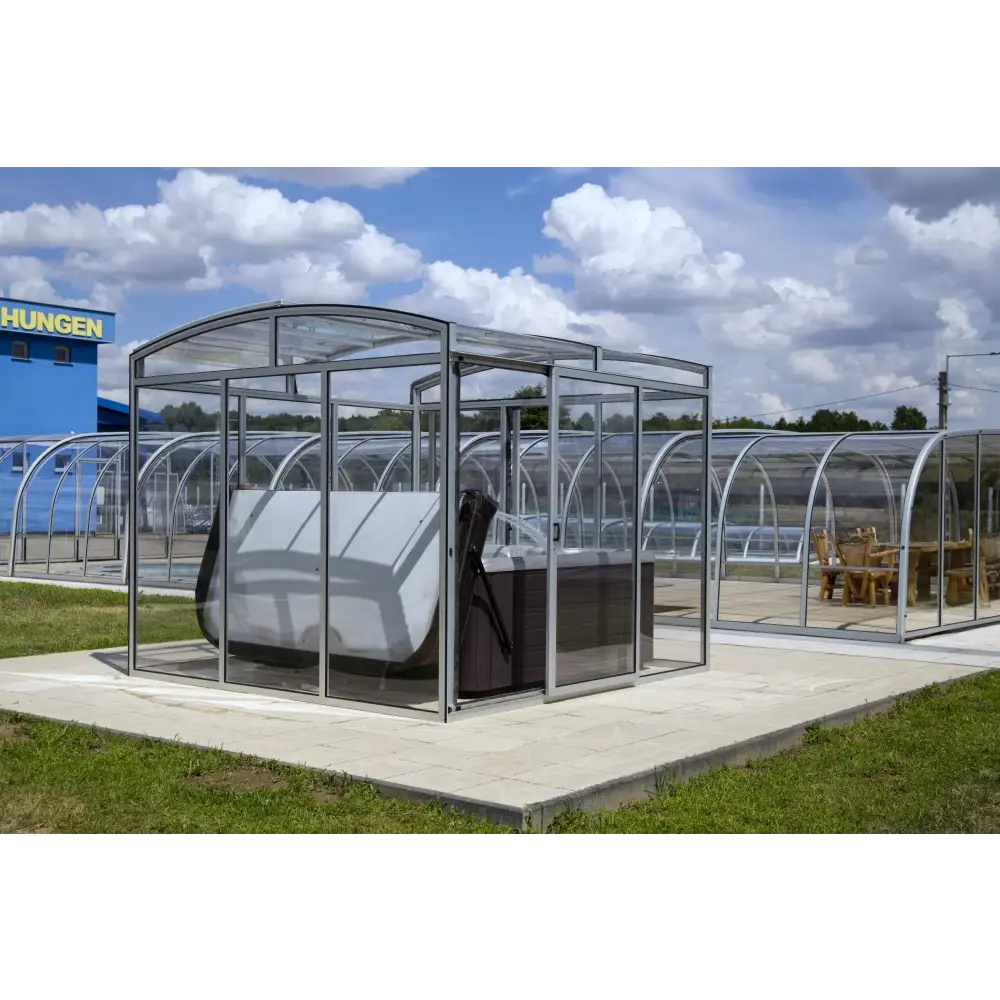 Spatak Luminosa med bågformad glasinrättning och mörkgrått bubbelbad