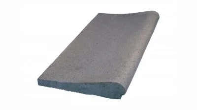 Grey concrete pool coping stone – rectangular shape, curved design, textured surface