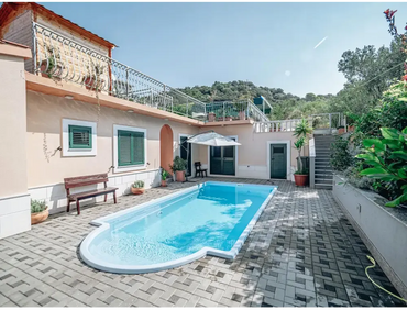 Aves fibreglass pool – Roman steps, rectangular shape, arched end, clear blue water, white-tiled edges