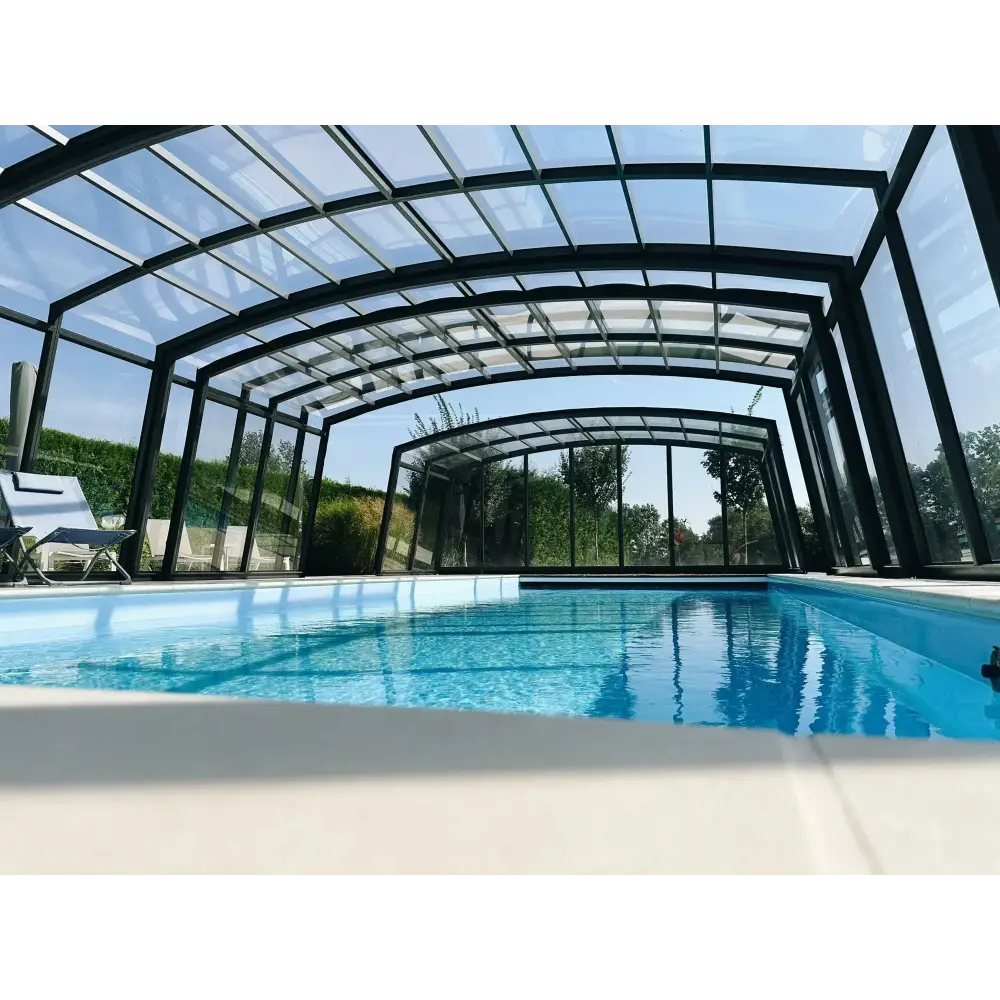 Blå glasfiberpool Bahama med förstärkt polyester, glastak och metallram