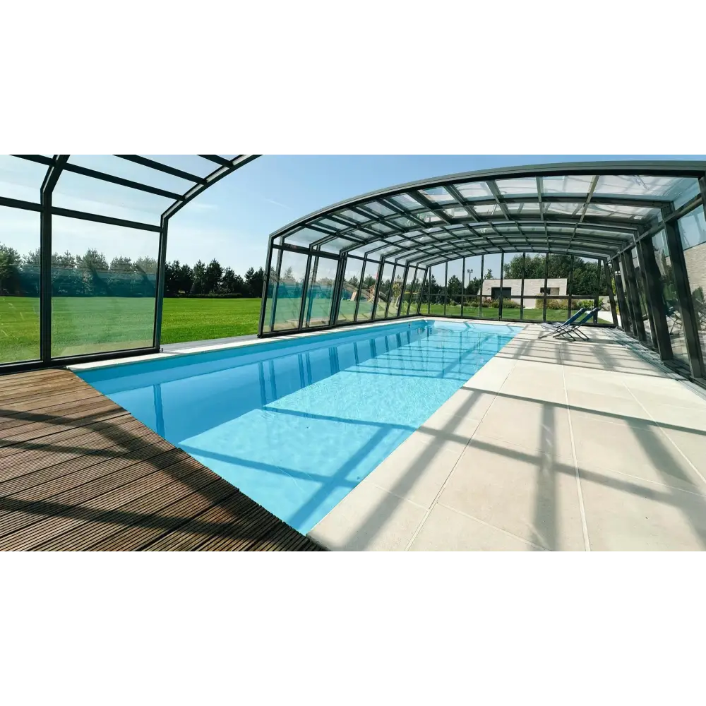 Blå glasfiberpool Bahama med transparent glastak och svart metallram