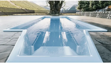 Grenada fibreglass pool – modern design, medium-sized model, white frame, light blue water