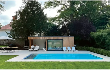 Leisurepools Cube pool – modern design, outdoors, wood-clad pool house, large glass doors