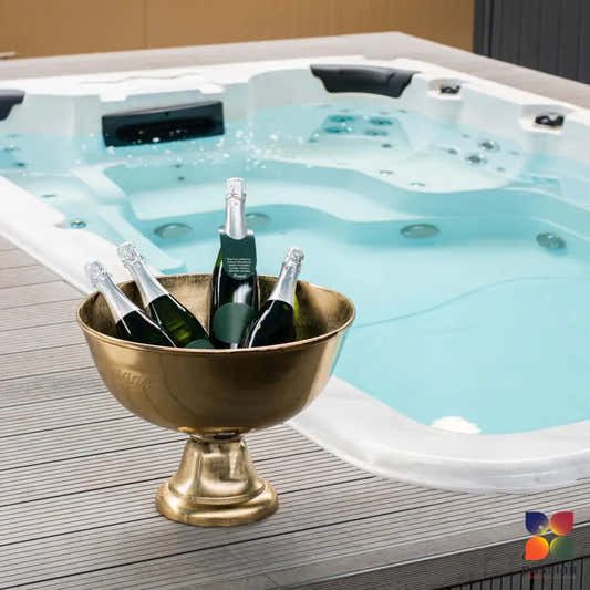 Gold-coloured pedestal champagne bucket – three green sparkling wine bottles
