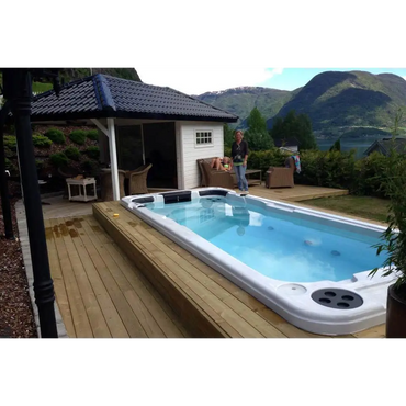 Vit PassionSpa Aquatic 2 Swim Spa – Sport Collection, vit rektangulär med blåvatten och svarta accenter