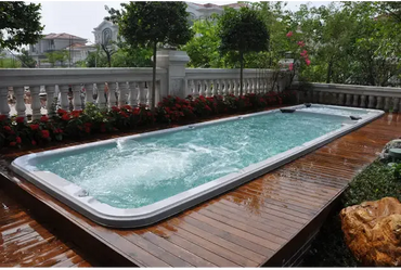 PassionSpa Aquatic 6 swim spa – turquoise water, wooden deck
