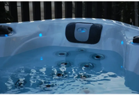 PassionSpa Desire hot tub – blue lighting, black and grey control panel