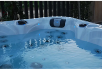 PassionSpa Desire hot tub – white finish, white interior, blue LED lighting, black panel