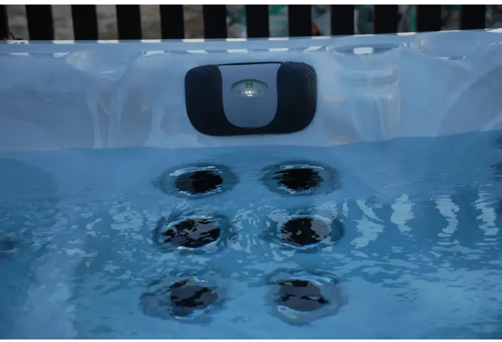 PassionSpa Desire hot tub – translucent white surface, Fisher logo