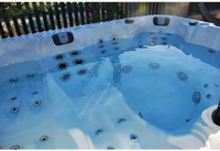 PassionSpa Desire hot tub – white finish, white interior, blue water, massage jets