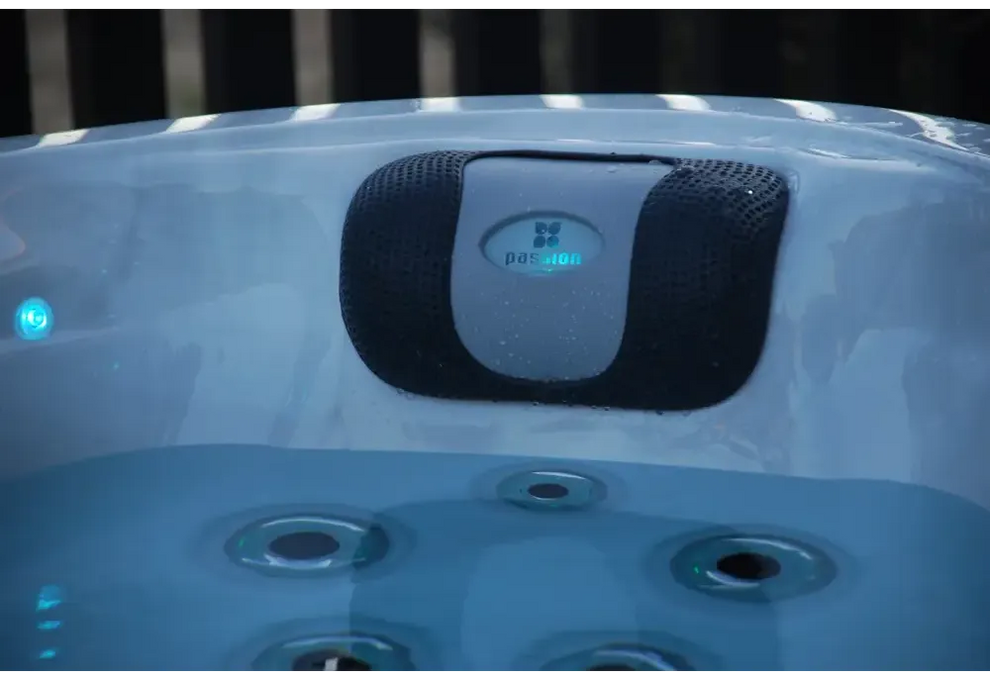 PassionSpa Desire hot tub – stylish design, black and grey speaker, blue Passion logo