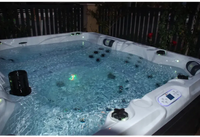 PassionSpa Desire hot tub – Signature Collection, white finish, blue water, black massage jets