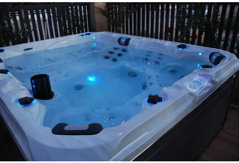 PassionSpa Desire hot tub – white finish, white interior, blue LED lighting, black accents