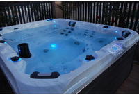 PassionSpa Desire hot tub – white finish, white interior, blue LED lighting, black accents