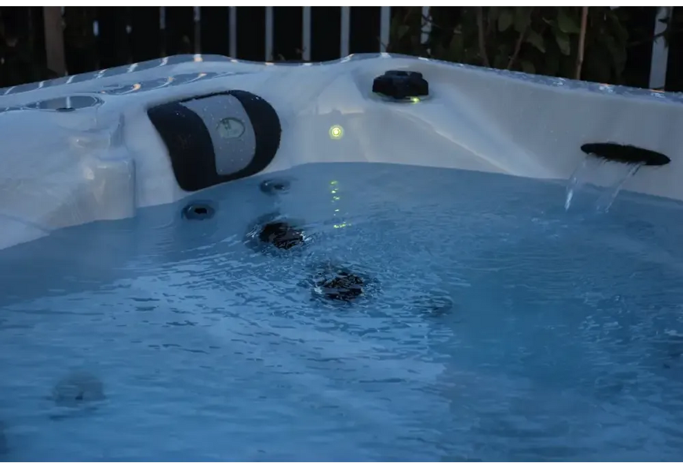 PassionSpa Desire hot tub – white interior, black panels, waterfall