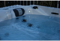 PassionSpa Desire hot tub – white interior, black panels, waterfall