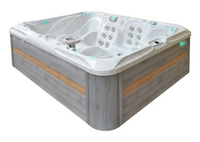 PassionSpa Desire hot tub – Signature Collection, white finish, grey wood panels, blue lighting