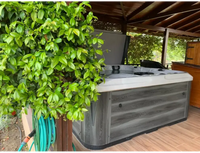 PassionSpa Euphoria Mighty Wave hot tub – grey wood-effect finish, white edge