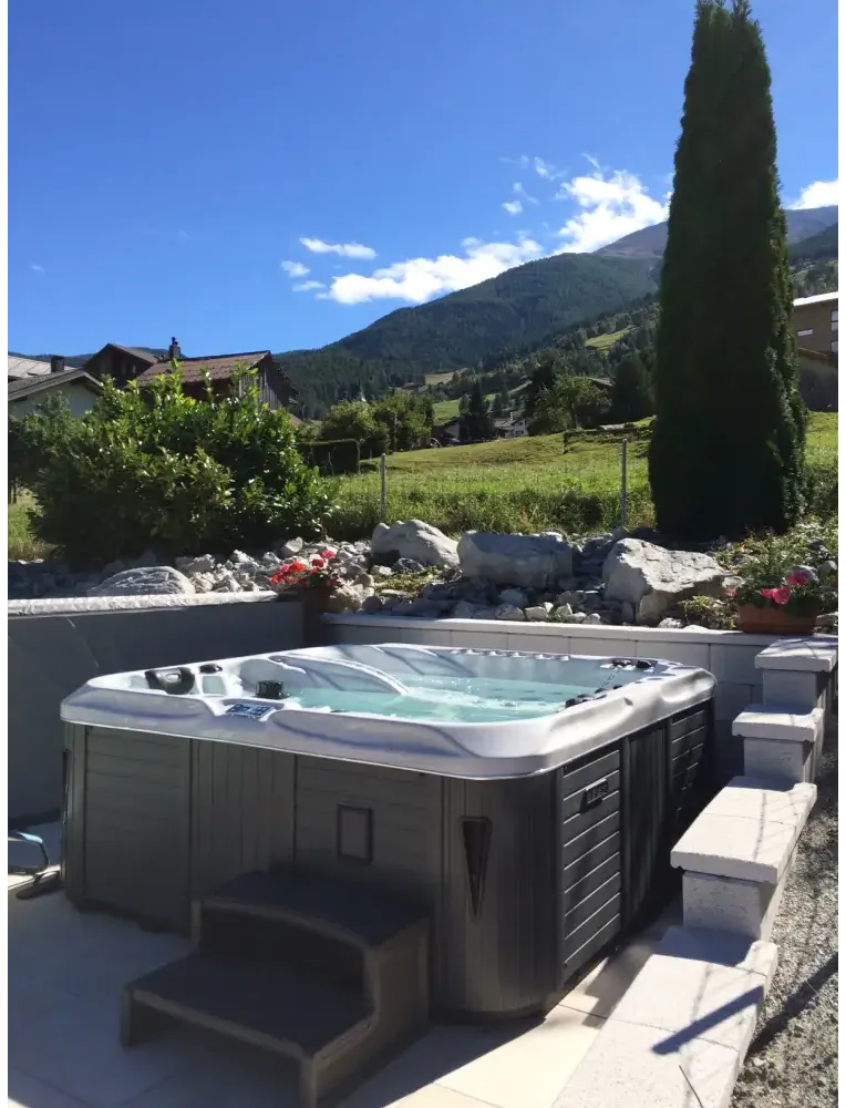 PassionSpa Euphoria Mighty Wave hot tub – white and grey, mountain view