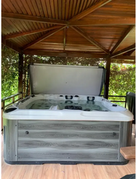 PassionSpa Euphoria Mighty Wave hot tub – grey wood texture, white interior, black massage jets