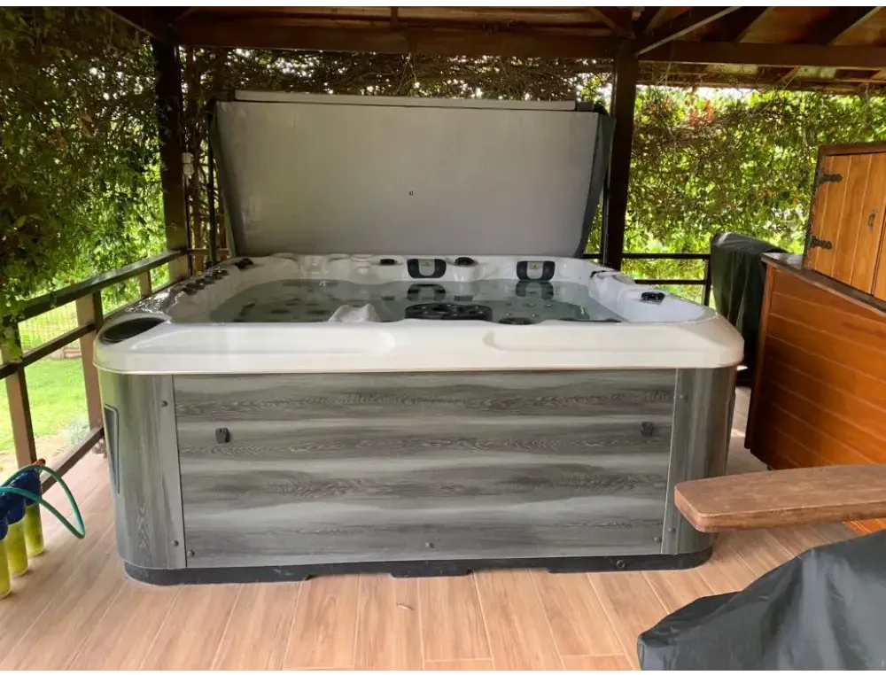 PassionSpa Euphoria Mighty Wave hot tub – grey wood-effect finish, white interior, black massage jets