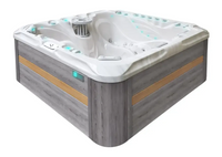 PassionSpa Felicity Mighty Wave hot tub – modern design, white finish, grey wood panels, amber accent