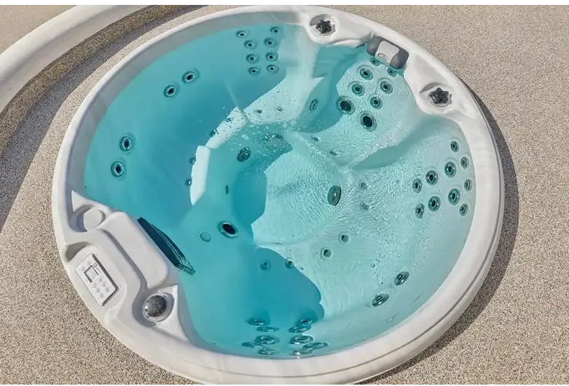 PassionSpa Recharge hot tub – Pure Collection, white finish, turquoise water, massage jets