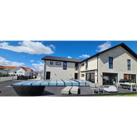 Modern tvåvåningshus med pooltaket Icon sarg klarplast antracit