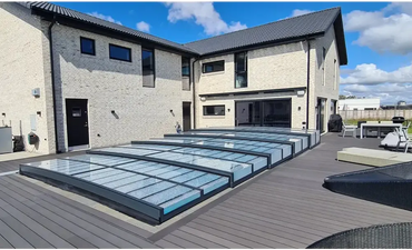 Icon pool enclosure – clear plastic panels, anthracite finish, modern transparent roof design
