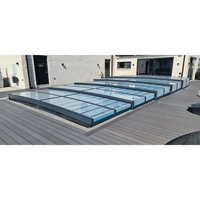 Modern glass roof panels with black frames over wooden deck, Pooltak Icon Kit