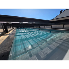 ICON KIT S3 pool enclosure – 4 x 9, elongated shape, rectangular pool, clear turquoise water, modern black pool enclosure, anthracite finish