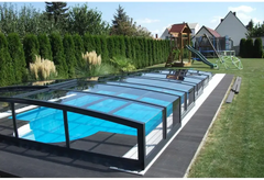 Pool enclosure – blue finish, roof with clear panels, RAL7016 anthracite profiles