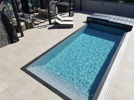 Pooltime Exclusive PP pool, 12 mm – 3.5 x 7 x 1.5 m, rectangular shape, clear blue water, black-tiled edges, buy a pool or pool enclosure