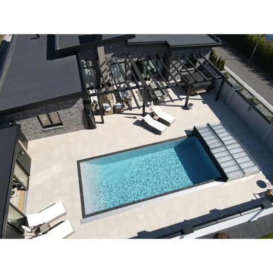 Pooltime Exclusive PP pool, 12 mm – rectangular shape, clear blue water, dark grey tiled edges, buy a pool enclosure