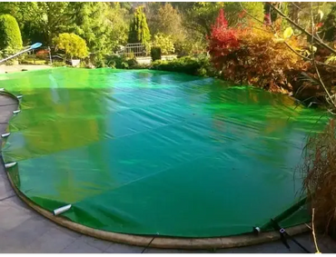 Green cover for a blue pool, hand unit included