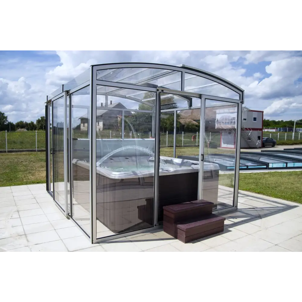 Spatak Luminosa med bågformad glasinrättning och mörkgrått bubbelbad