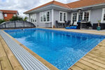 Thermopool Standard – in-ground, rectangular pool, blue mosaic tiles, wooden deck